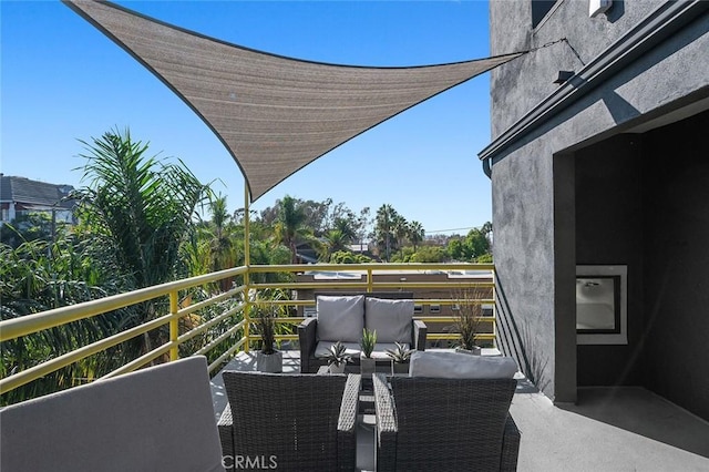 balcony featuring outdoor lounge area