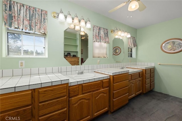 bathroom featuring vanity and ceiling fan