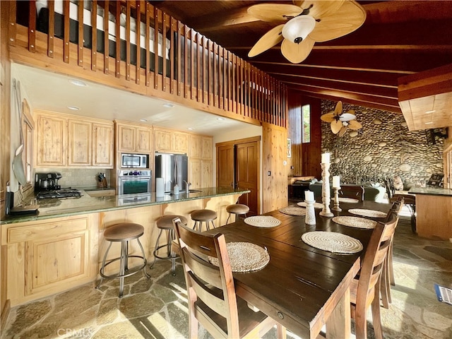 dining room with ceiling fan