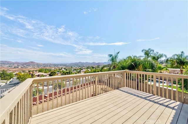 wooden terrace with a mountain view