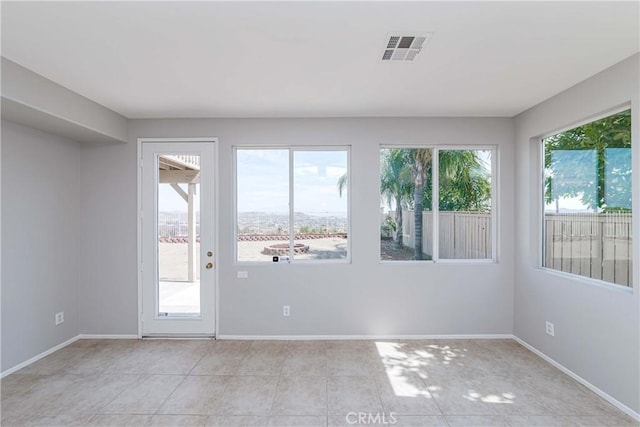 view of tiled spare room