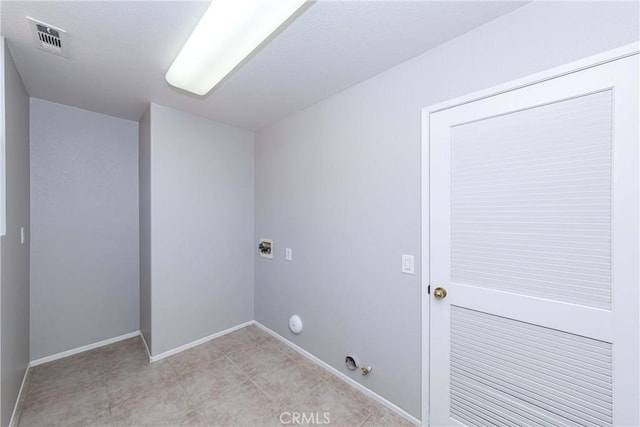 clothes washing area with hookup for a gas dryer and electric dryer hookup