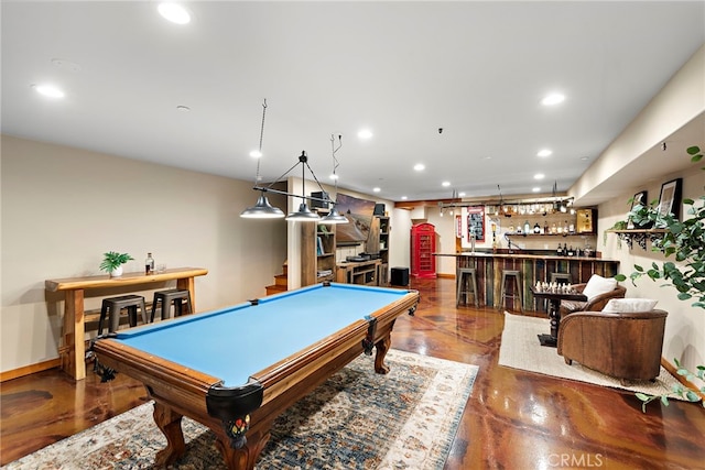 rec room featuring pool table and bar area