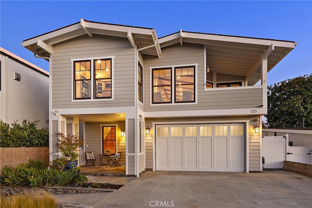 view of front of property featuring a garage