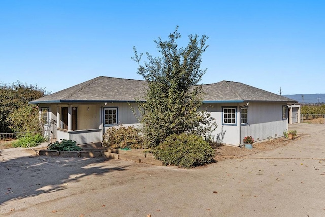 view of front of property featuring covered porch