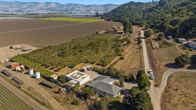 drone / aerial view with a rural view and a mountain view