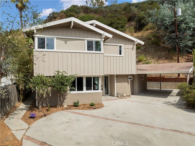 view of front of house with a carport