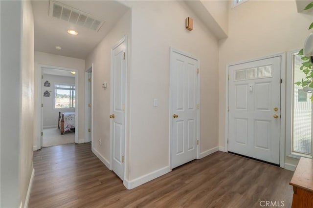 foyer featuring dark hardwood / wood-style floors