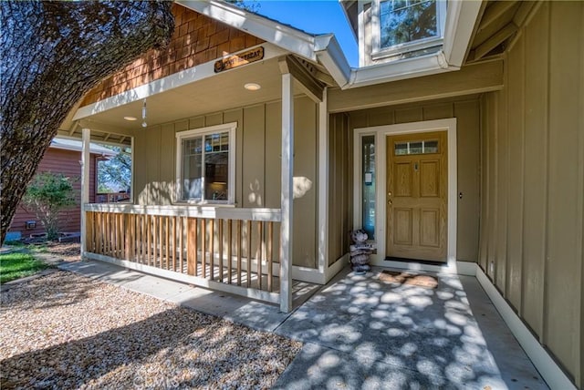 doorway to property featuring a porch