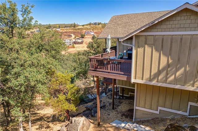 exterior space featuring a wooden deck