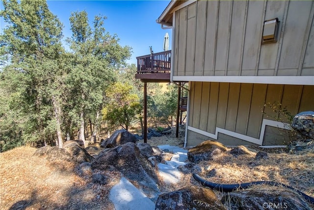 view of home's exterior featuring a deck