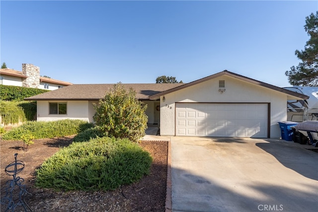 ranch-style house with a garage