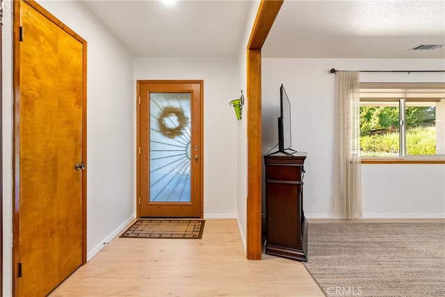 entrance foyer with light wood-type flooring