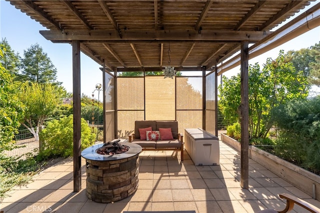 view of patio / terrace with a fire pit