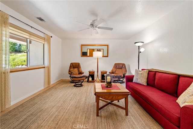 living room with ceiling fan