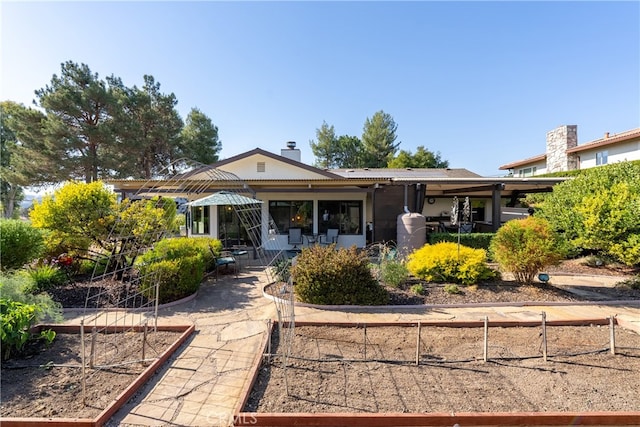 view of front of home with a patio area