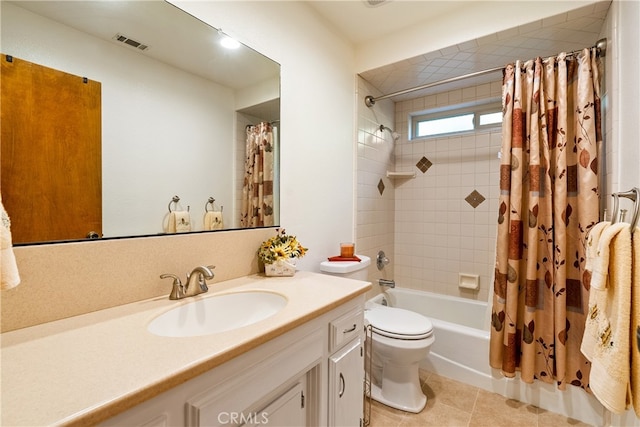 full bathroom with vanity, tile patterned floors, toilet, and shower / bath combo