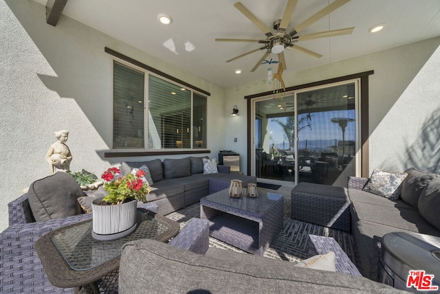 view of patio / terrace with an outdoor hangout area and ceiling fan