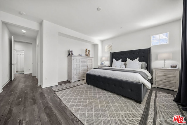 bedroom featuring hardwood / wood-style floors