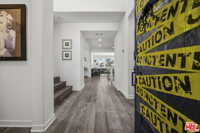 hallway featuring hardwood / wood-style floors