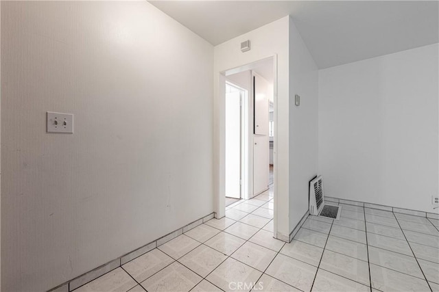 interior space featuring light tile patterned floors