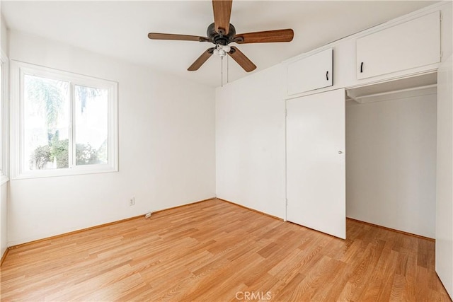 unfurnished bedroom with a closet, ceiling fan, and light hardwood / wood-style flooring