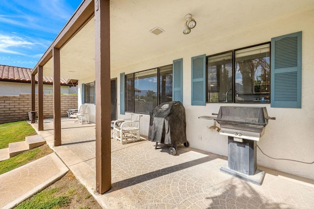 view of patio / terrace with a grill