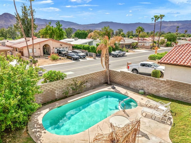 view of pool featuring a mountain view