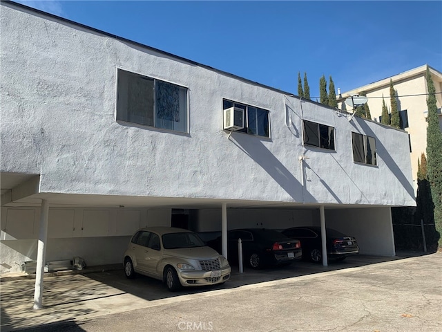 exterior space featuring a carport