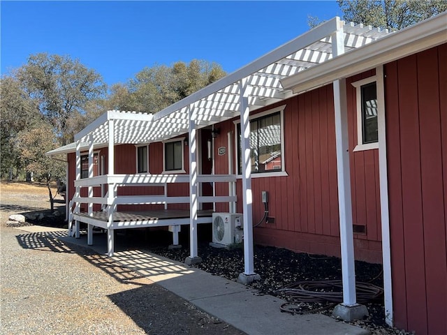 view of home's exterior with ac unit