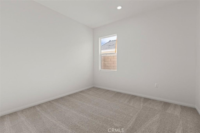 spare room with carpet floors