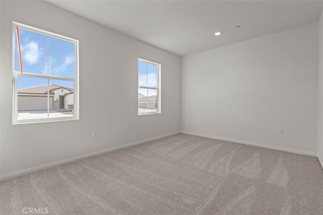 view of carpeted spare room