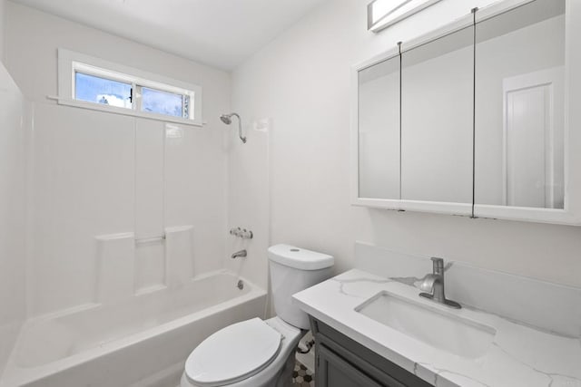 full bathroom featuring bathing tub / shower combination, vanity, and toilet