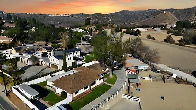 aerial view at dusk with a mountain view