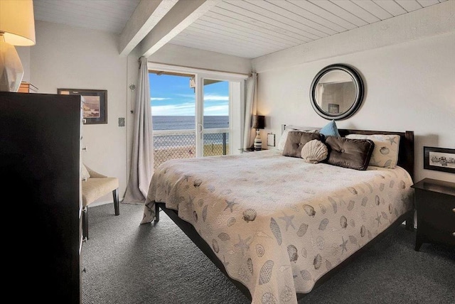 bedroom featuring carpet flooring, beamed ceiling, a water view, and wooden ceiling