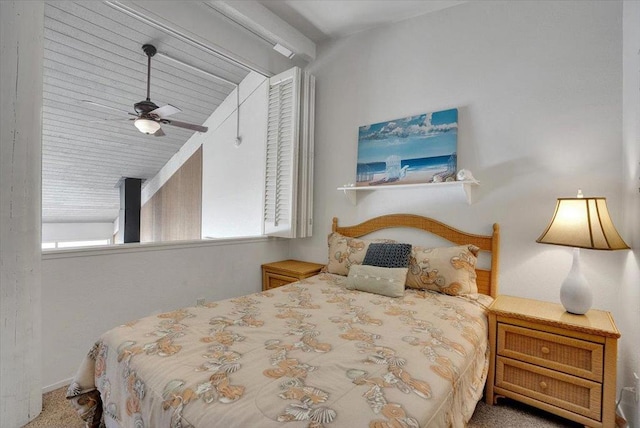 bedroom featuring carpet flooring, multiple windows, and ceiling fan