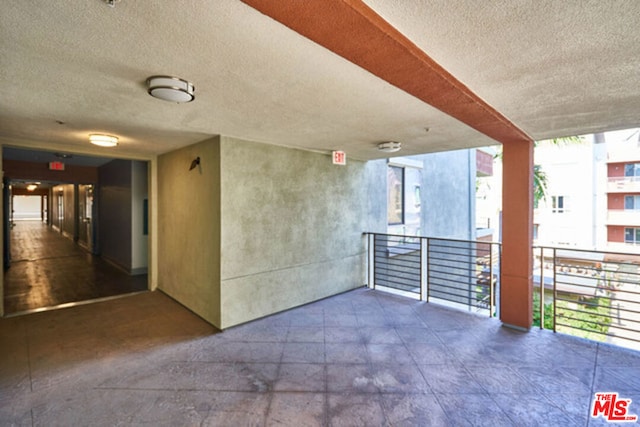 view of patio / terrace with a balcony