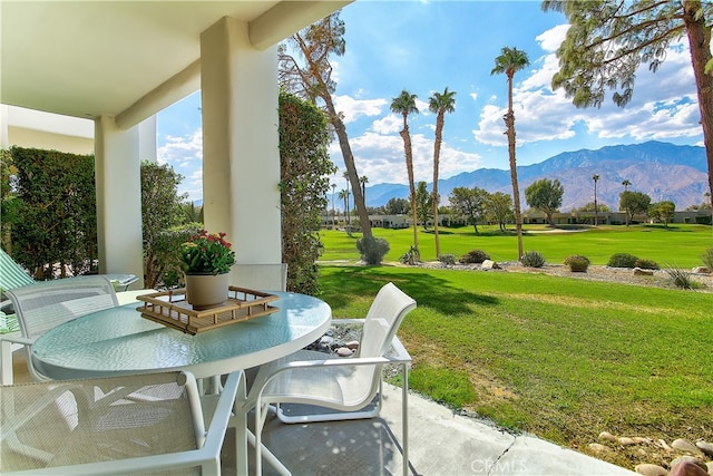 view of patio / terrace with a mountain view