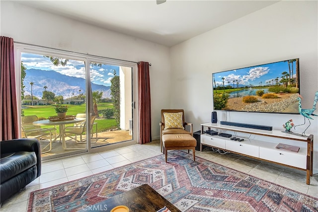 sitting room featuring light tile patterned flooring and plenty of natural light