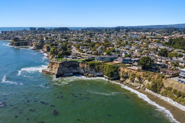 bird's eye view with a water view and a view of the beach