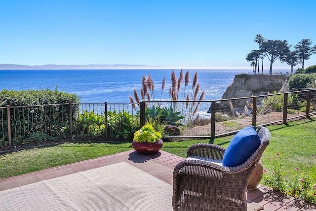 view of patio / terrace featuring a water view