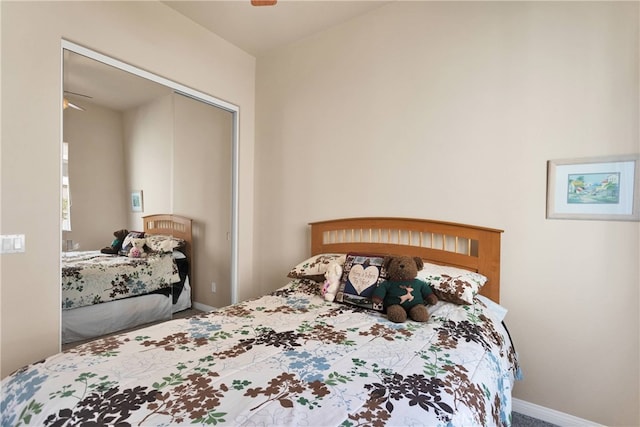 carpeted bedroom with a closet