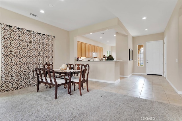 view of carpeted dining room