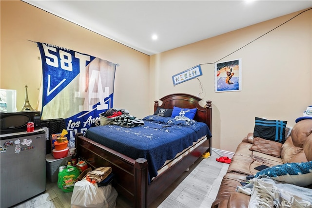 bedroom featuring light hardwood / wood-style flooring