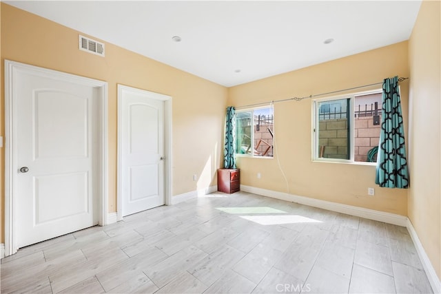 unfurnished bedroom featuring light hardwood / wood-style flooring