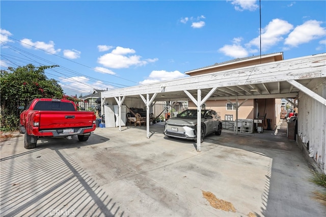 view of car parking with a carport