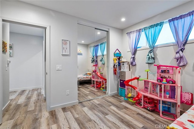 24120 Manzanita St, Menifee, CA 92584 - playroom with recessed lighting, baseboards, and wood finished floors