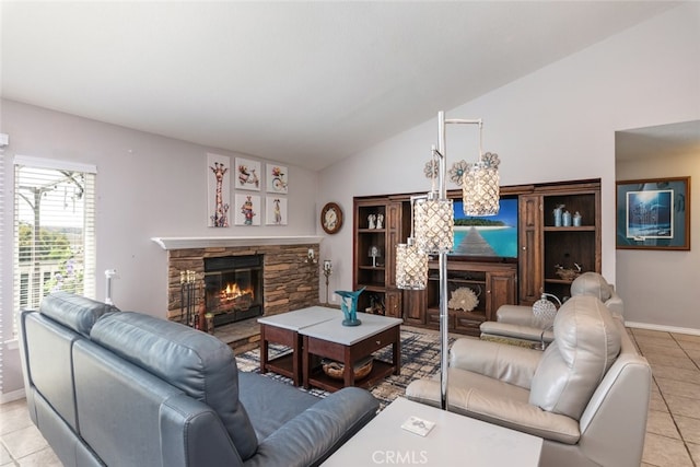 tiled living room with lofted ceiling and a fireplace