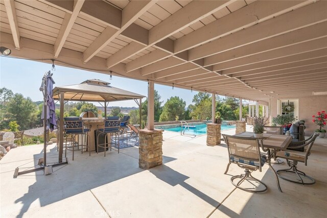 view of patio featuring a gazebo