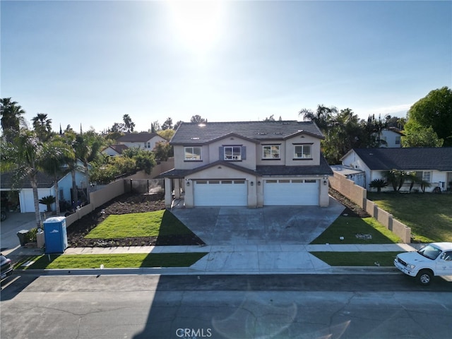 view of front facade with a front lawn and a garage